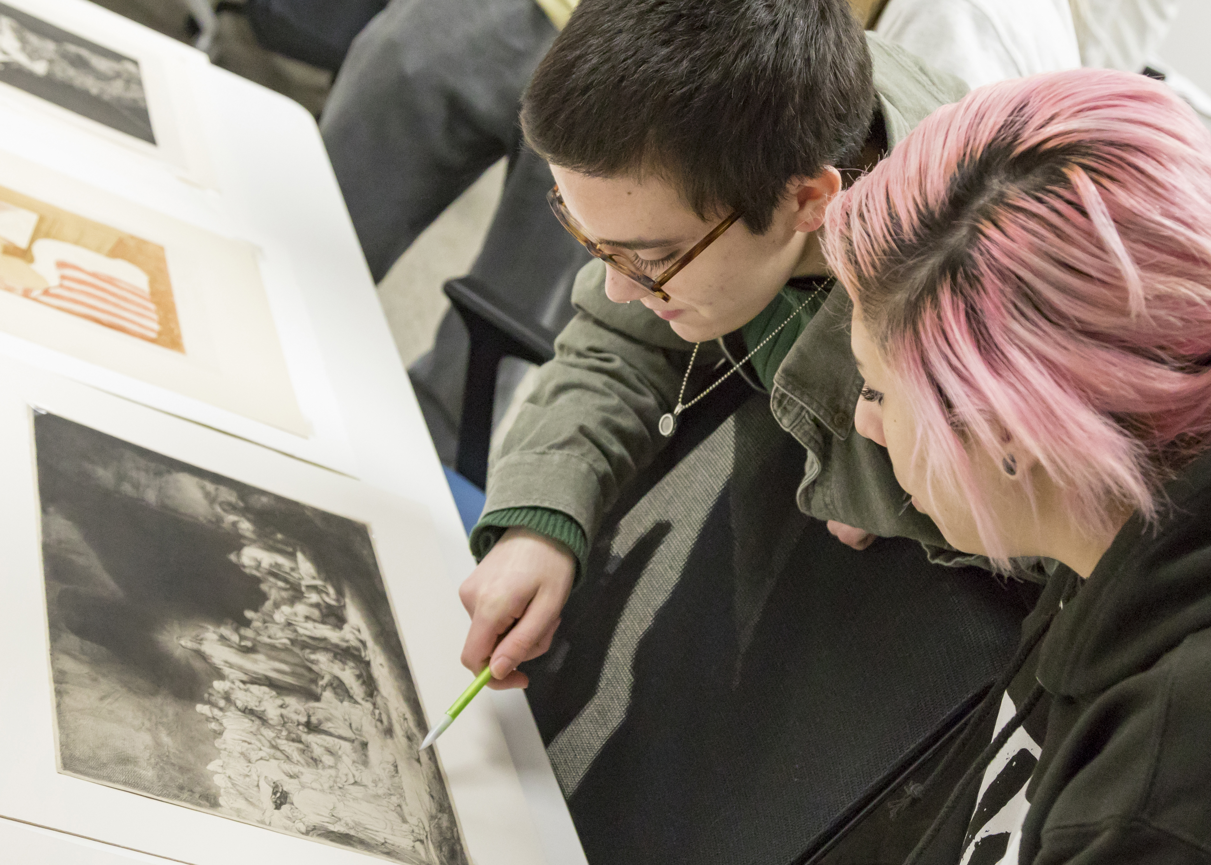 Image for Students examine prints from the College’s archives as part of an integrative learning course with faculty from Muhlenberg’s History Department. Our curriculum approaches art with an interdisciplinary, interactive and international lens. 