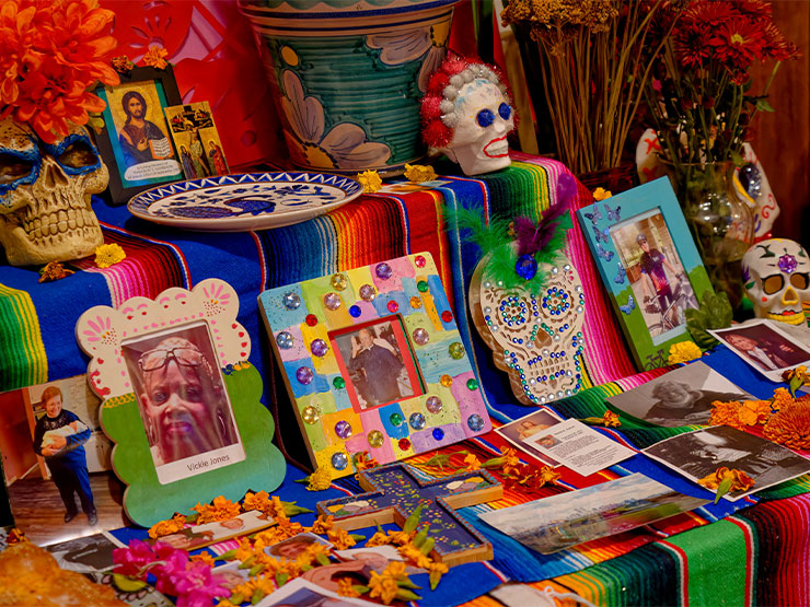 A colorful ofrenda, or alter, is filled with pictures and momentos for the traditionally Mexican celebration El Día de los Muertos.