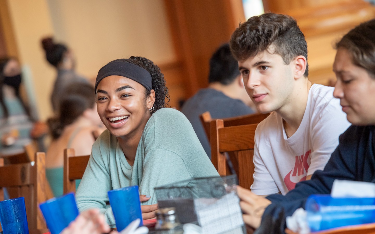 Students chat over a meal at Wood Dining Commons.