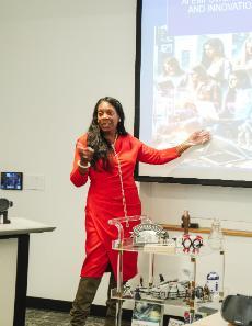 A professor presenting in a classroom