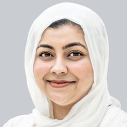 A headshot of Ashupta Farjana, who is wearing a white headscarf