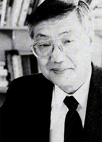 An old black and white headshot of a Korean man in glasses