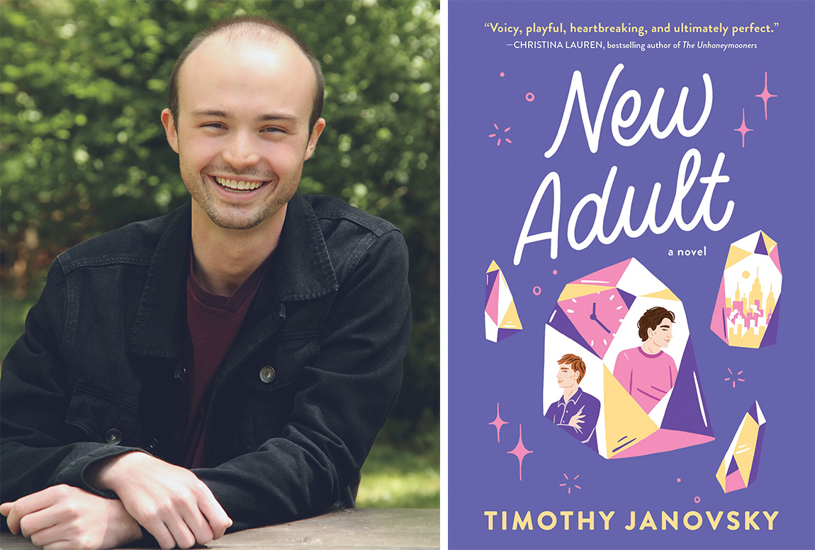 At left, in front of green foliage, a white man with brown buzzed hair and facial scruff sits, leaning slightly to the left, mid-laugh. He wears a black denim jacket over a maroon T-shirt. At right, a purple book cover with