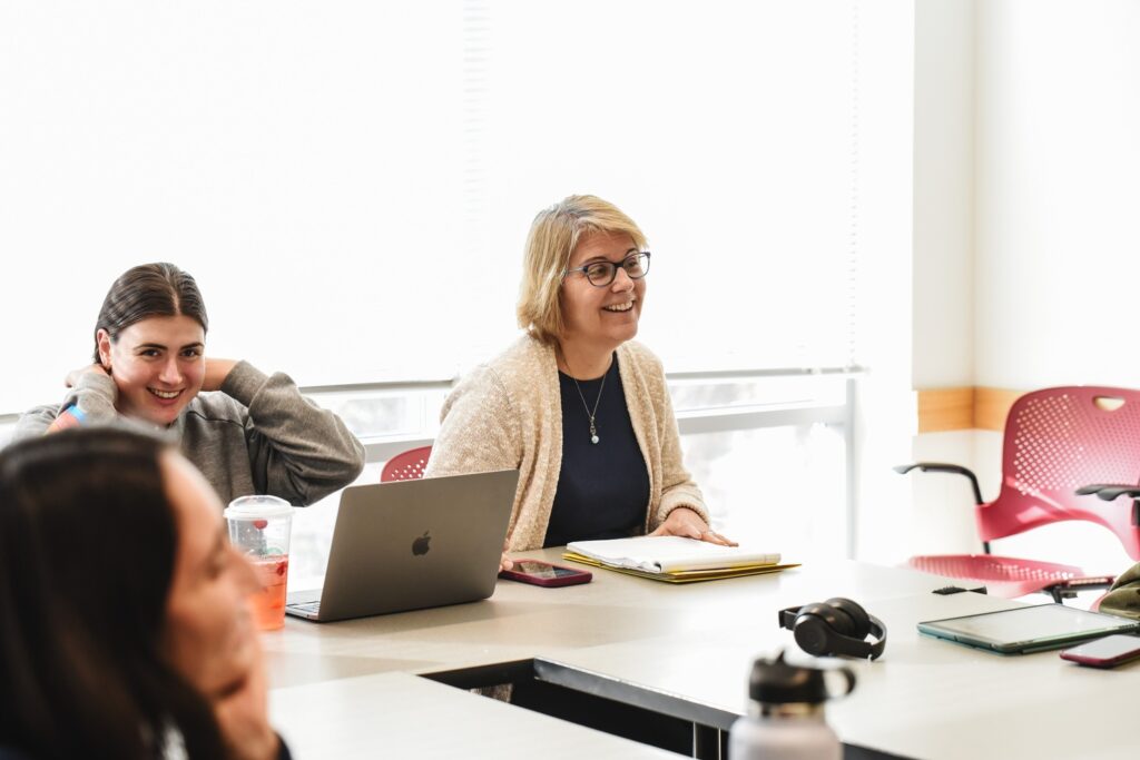 An instructor and students in a public health class.