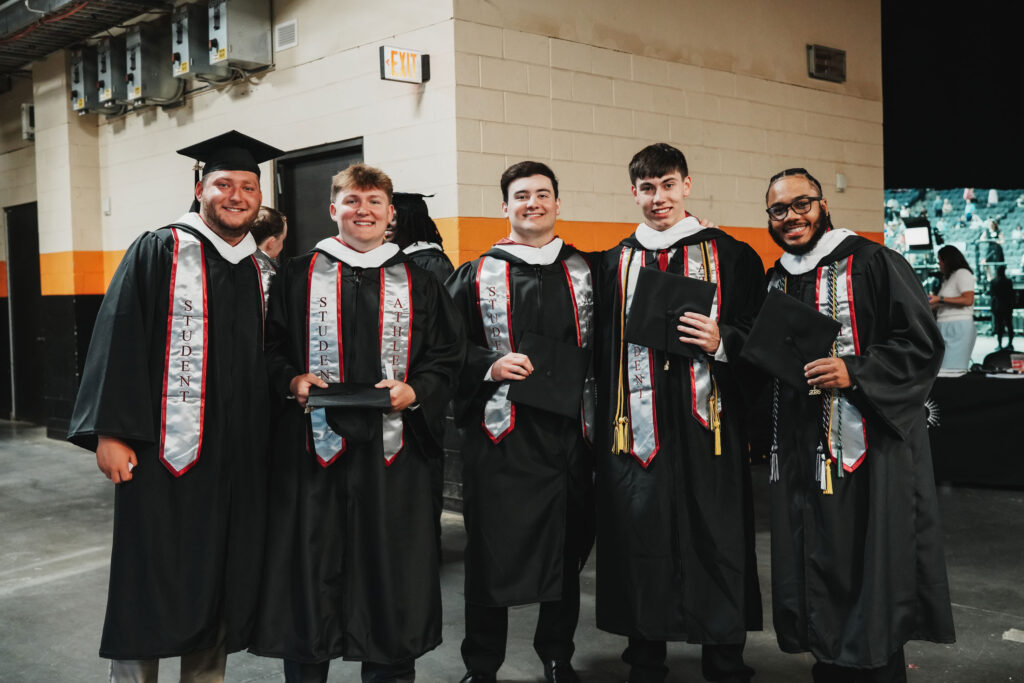 Five college graduates before commencement