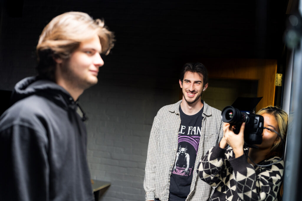 Muhlenberg students film one another for a scene in a film studies course.