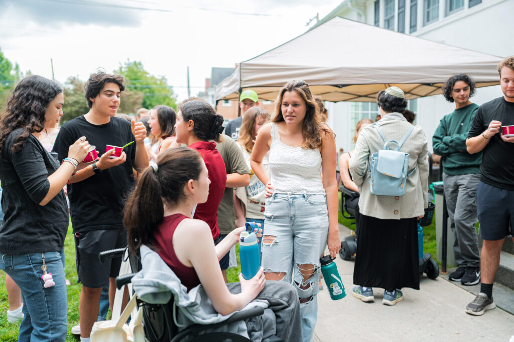 College students chat at a Hillel welcome event