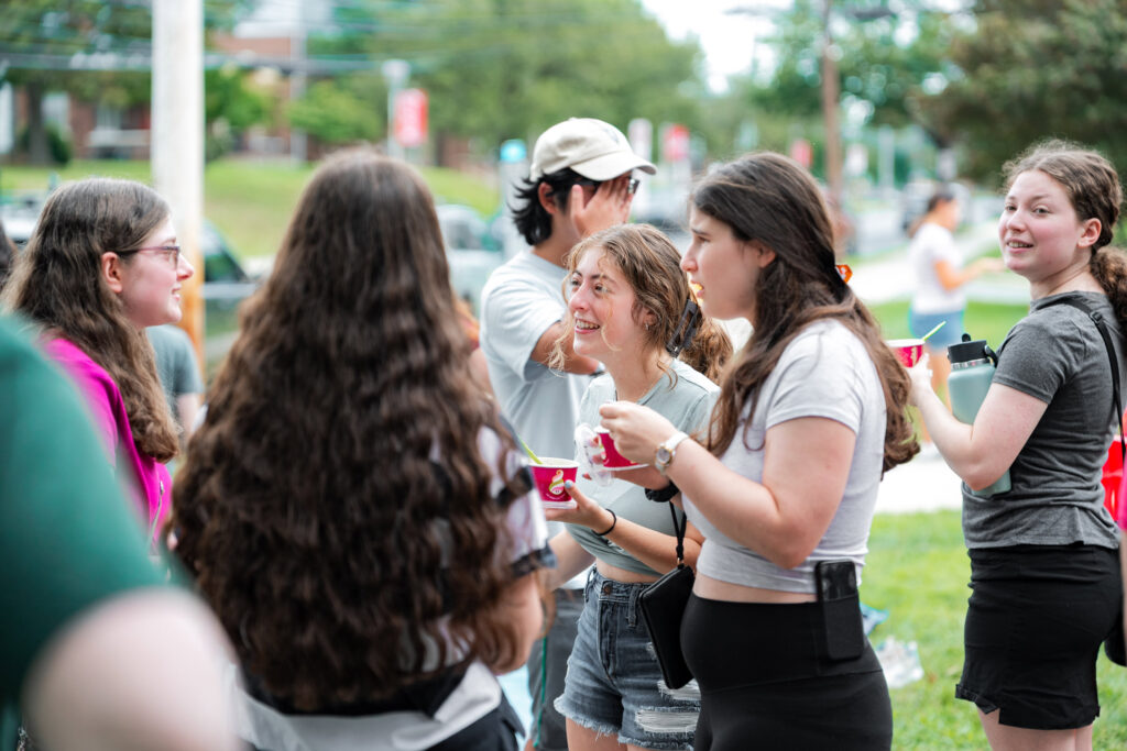 College students chat at a Hillel welcome event