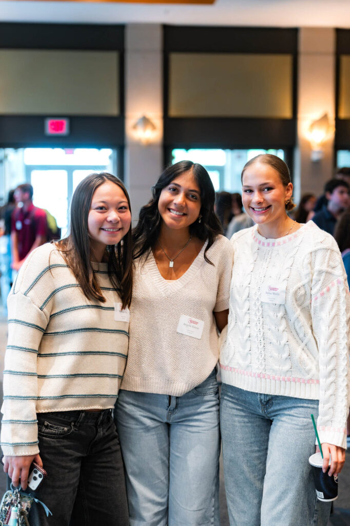Three Muhlenberg College students stand together