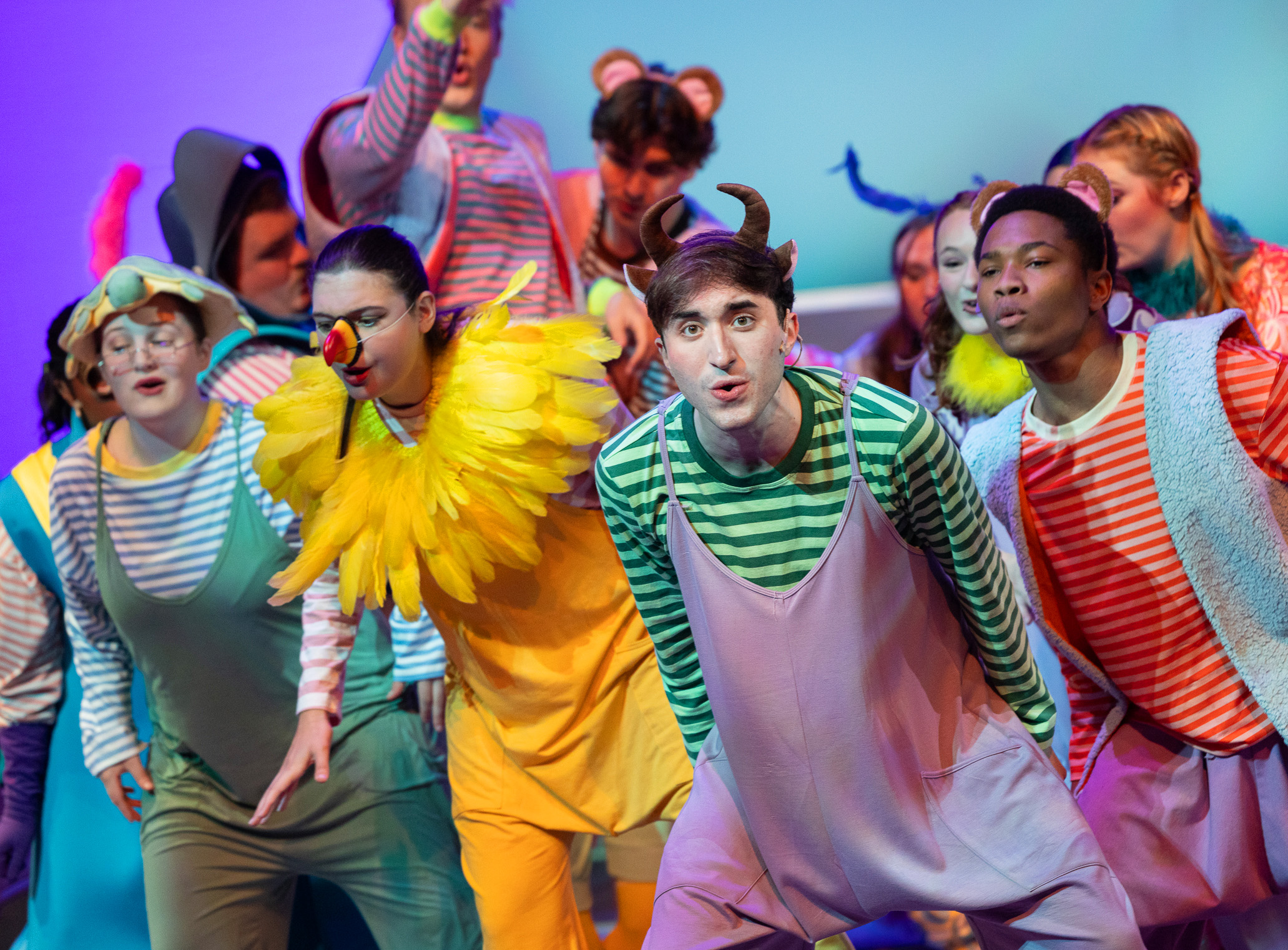 Cast members of SEUSSICAL perform on stage