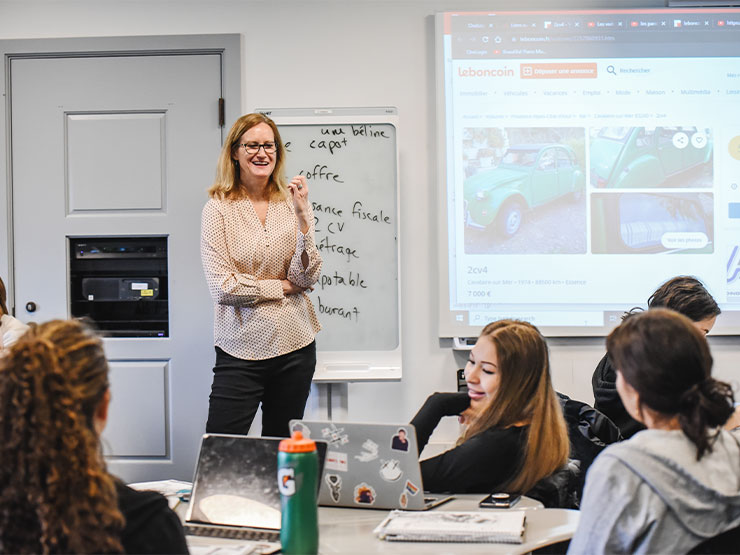 students and professor in a French class