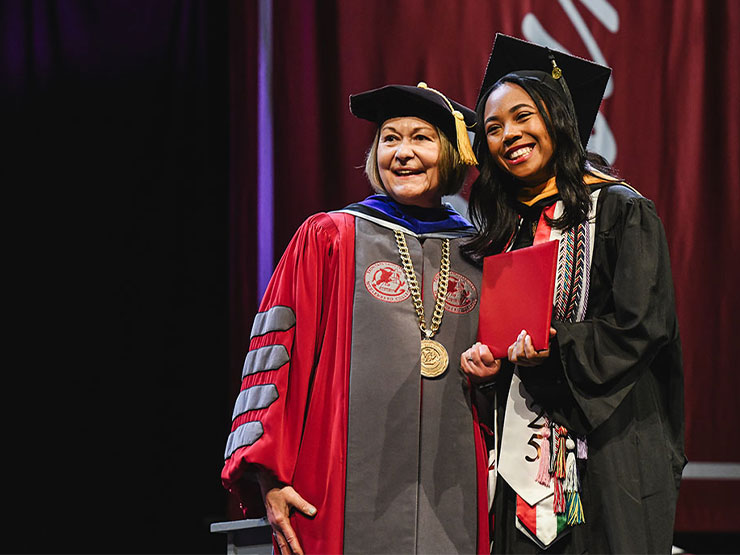 Muhlenberg College President Kathleen Harring with a new graduate at the college's 2025 commencement ceremony