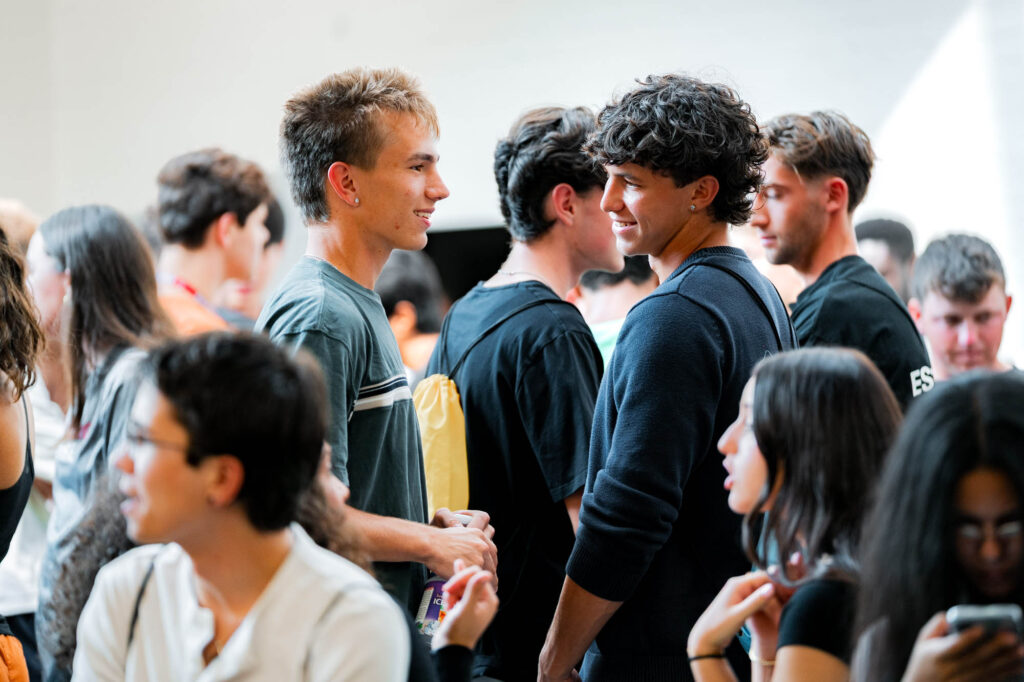 New Muhlenberg College students converse during orientation