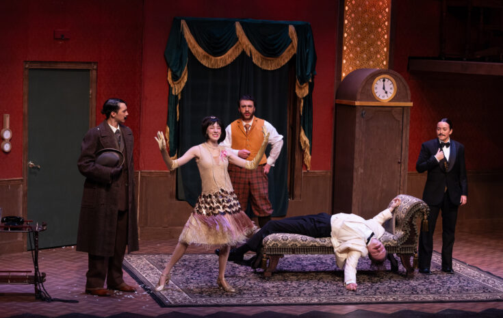 A group of college students perform in a play