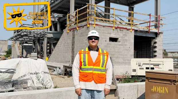 Troy Conlon wears protective gear at a construction site.