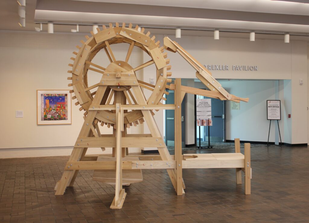 A large wooden waterwheel.