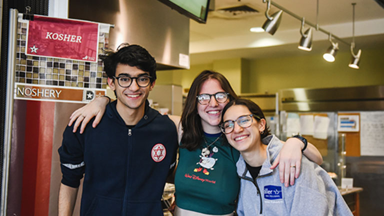 Dining Services A group of students standing in the dining hall