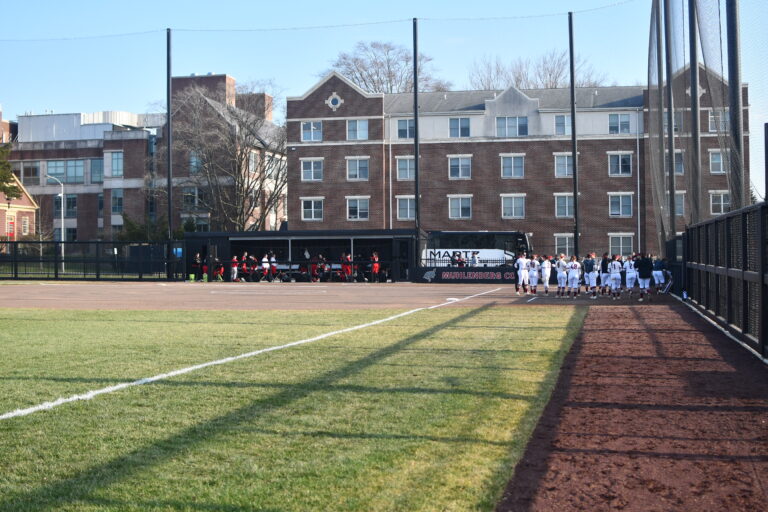 The on-campus Mules Softball field, showing residence halls in the background.
